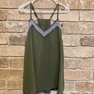 Army green tank with adjustable sleeves and intricate detailing